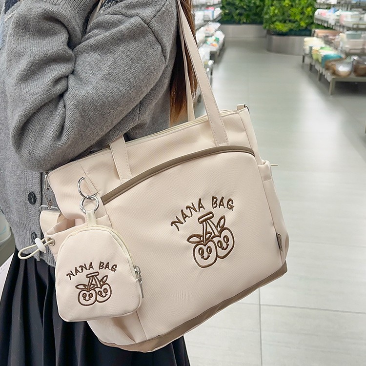 High appearance level, trendy multi-functional bag, female student embroidered cartoon small schoolbag, versatile single-shoulder crossbody bag, book bag Application Scenario