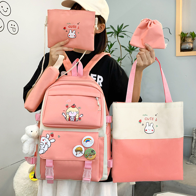 Wholesale of new four-piece schoolbags for junior and senior high schools, large-capacity Korean-style backpacks, casual and fashionable canvas girls' backpacks Application Scenario