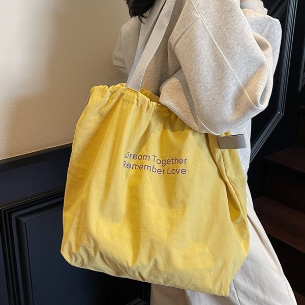 Solid color daily single fashion, casual, simple and lightweight folding handbag, casual shopping bag, shoulder bag, versatile bag details Picture