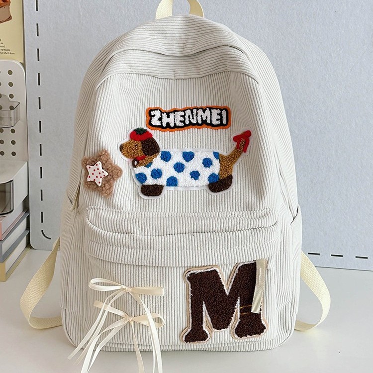 New autumn and winter 2024 Cute cartoon dog student backpack with large capacity and sweet bow for girls Specification drawing