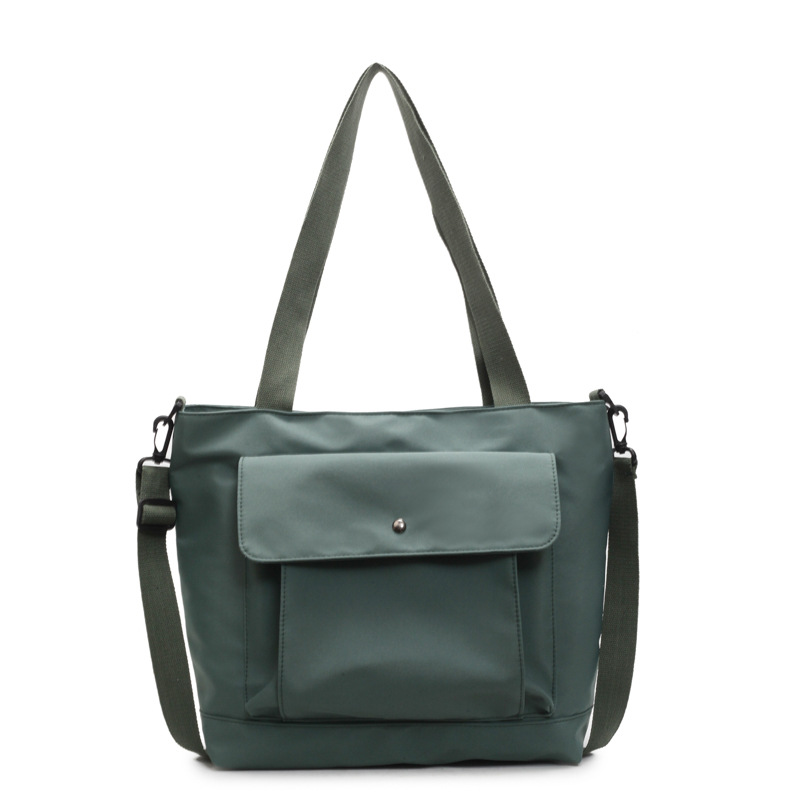 Hong Kong-style retro casual large-capacity tote bag for women 2025 new fashion trend hand-held cloth bag simple single-shoulder bag Item Picture