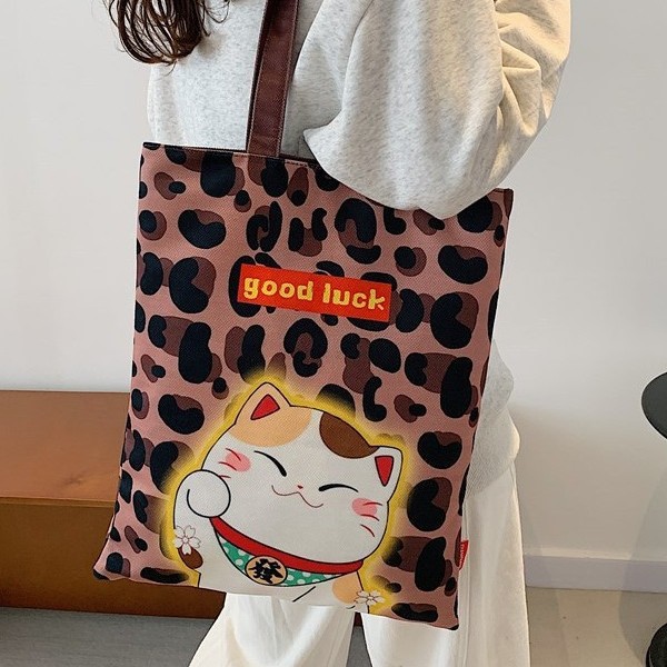 Cartoon single-shoulder fashionable shoulder bag, student tote bag, universal printed cute cat bag, internet-famous handbag, Korean version bag details Picture