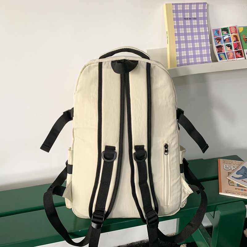 Unisply-style backpacks, large capacity and simple design for college students, casual schoolbags for junior high school students, versatile backpacks for outings and travels Specification drawing