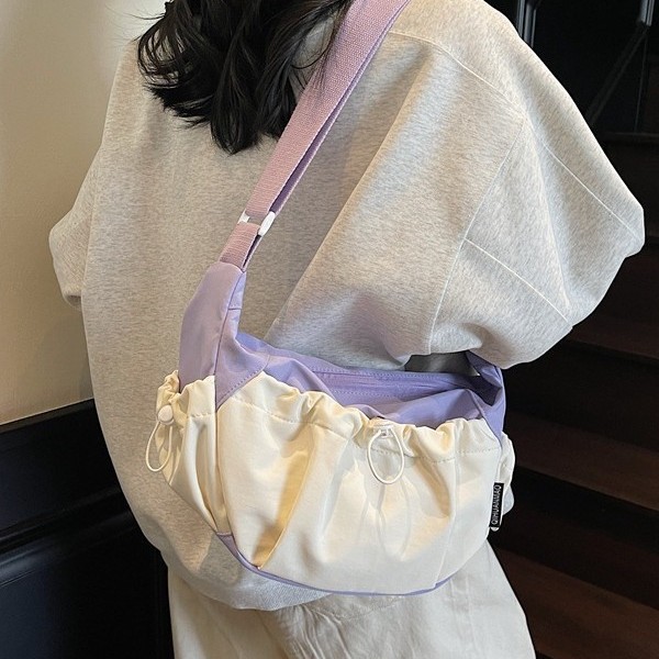 A new, niche, color-blocking, lightweight outdoor backpack for casual girls with a large capacity drawstring opening in 2025 details Picture