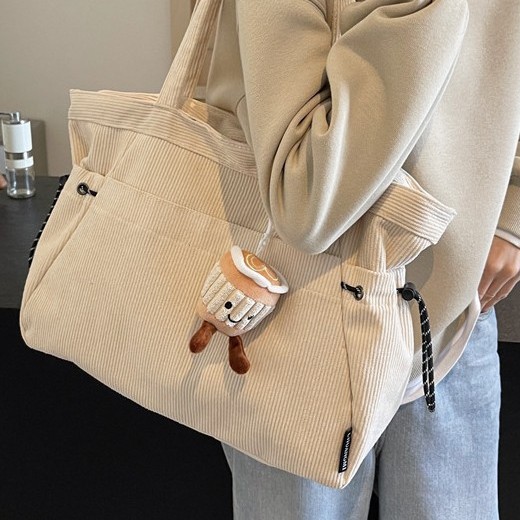 The 2024 new Tote bag is a stylish, simple, casual and versatile velvet autumn and winter fashion tote bag with large capacity full figure