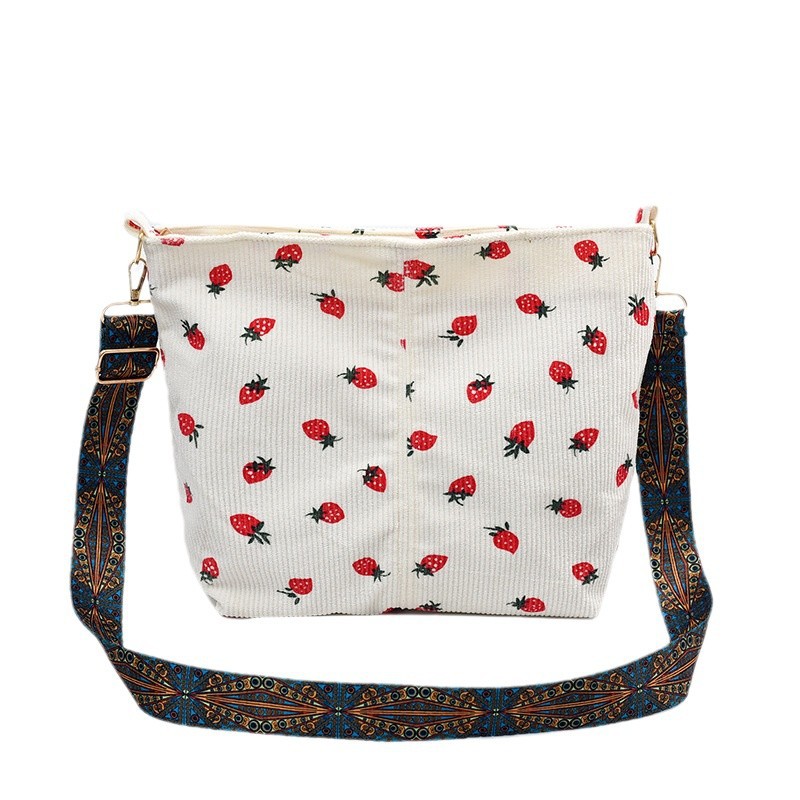The 2024 new casual and fashionable commuter bag for women is a versatile and cute strawberry wide shoulder strap single-shoulder bucket bag Item Picture