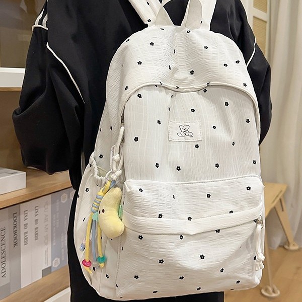 This new cute and ins-style polka dot backpack is lightweight for girls and versatile for students' school bags with a large capacity details Picture