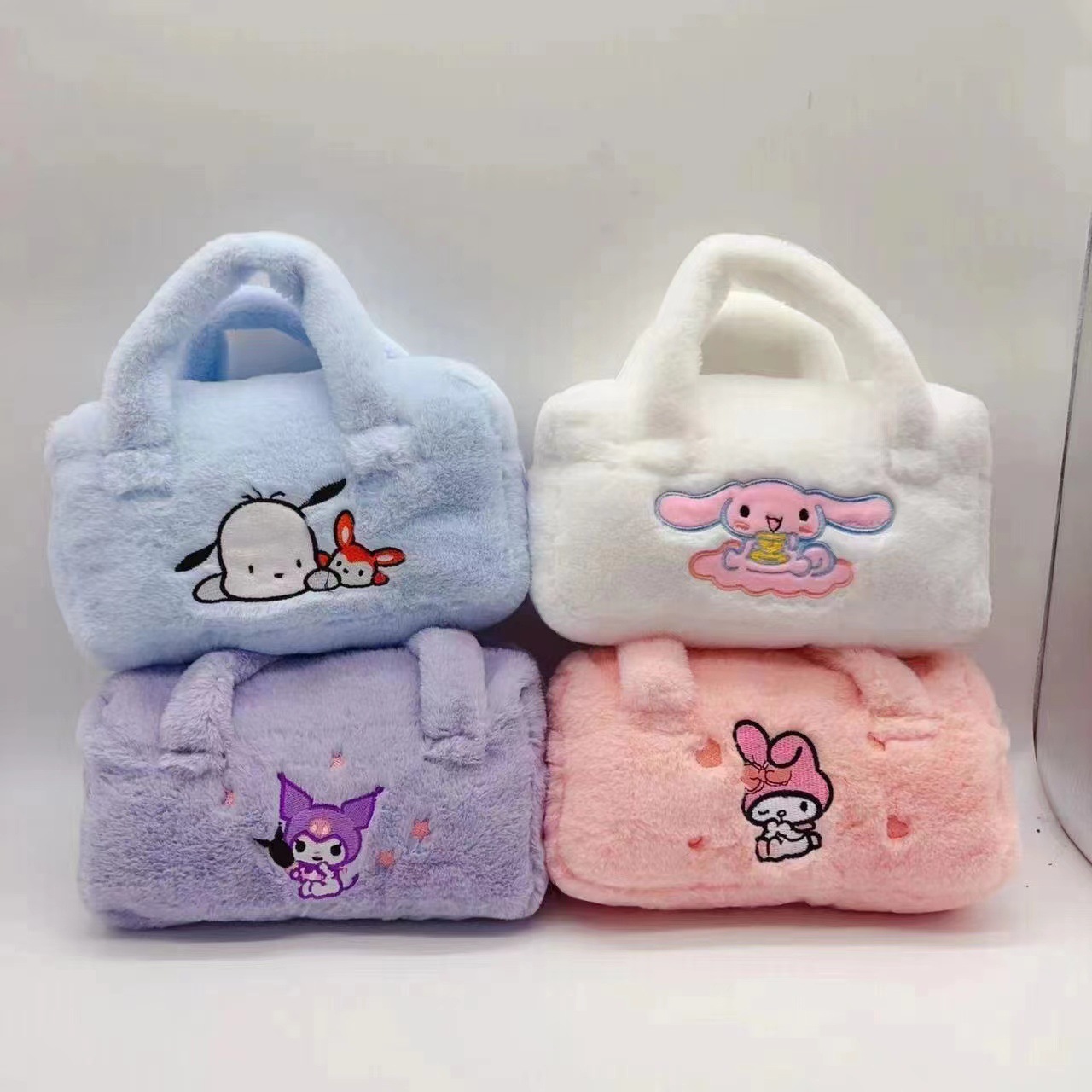 Wholesale of new colorful Sanrio handbag, Cinnamon Dog, Kuromi and Melody plush toy wrist bag details Picture