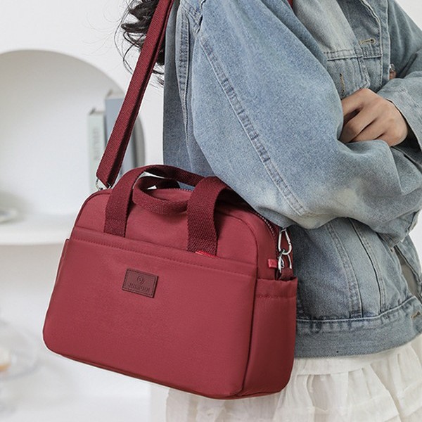Lightweight and large-capacity single-shoulder women's bag 2025 Spring New cross-border trend solid color nylon fabric hand-held crossbody bag Application Scenario