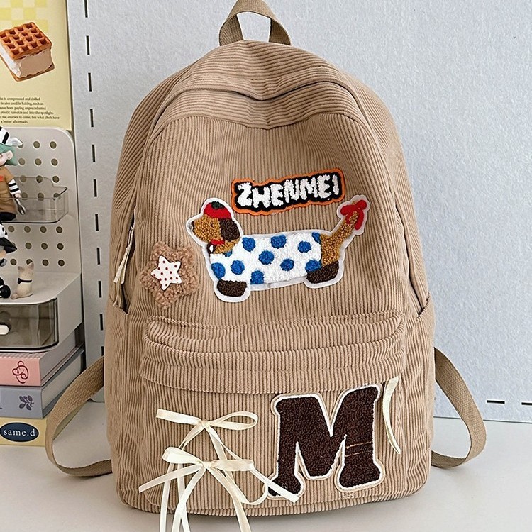 New autumn and winter 2024 Cute cartoon dog student backpack with large capacity and sweet bow for girls full figure