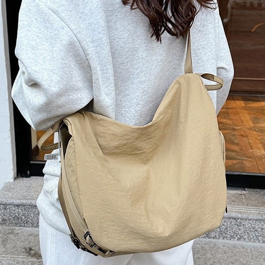 Lightweight bag for women, Spring 2025 collection: Fashionable hand-held backpack, dual-purpose single-shoulder fashionable washable fabric crossbody bag details Picture