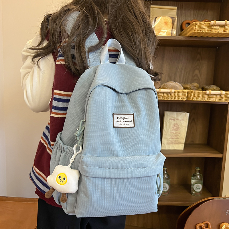 New Korean style ins forest-themed campus fresh and clean schoolbag for girls, a light backpack for primary and secondary school students in grades 3 to 5 full figure