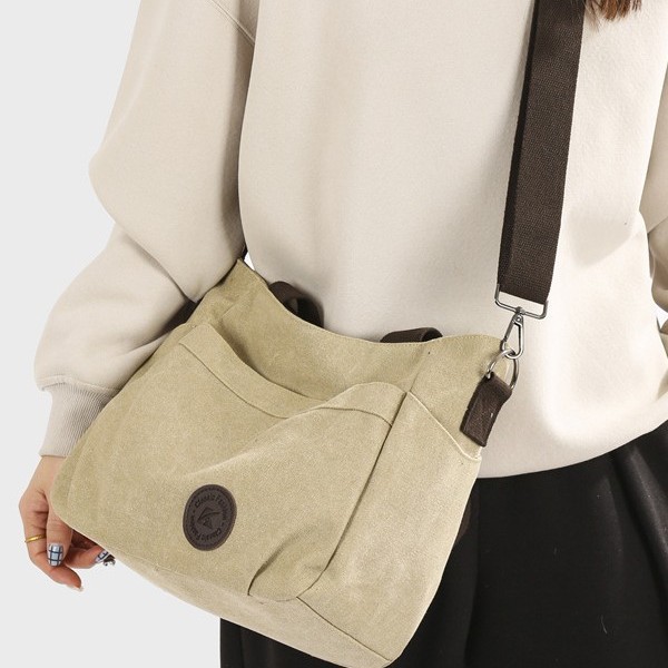 New winter 2024 canvas bag, large capacity, wide shoulder strap, simple women's bag, shopping handbag, casual crossbody bag Application Scenario