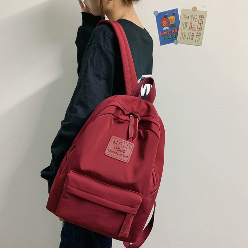Wholesale of large-capacity, fashionable and trendy travel backpacks for high school and junior high school students in the Korean version of cross-border backpacks full figure