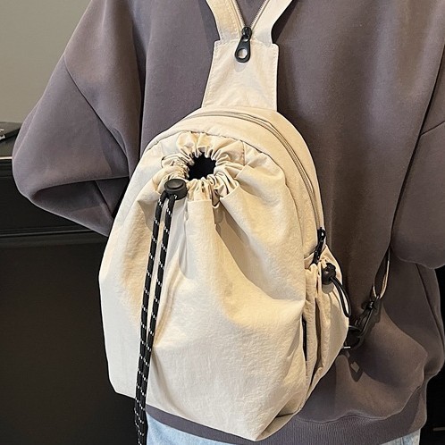 Trendy, classic and elegant crossbody bag, fashionable commuting travel shoulder bag, lightweight solid color drawstring, versatile mini backpack full figure