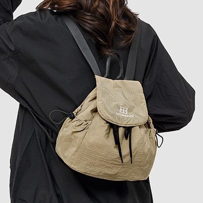 "Fashion 2025 Spring Mini Backpack for Women: A laid-back style solid-color casual outdoor bag with a high-quality small size. full figure