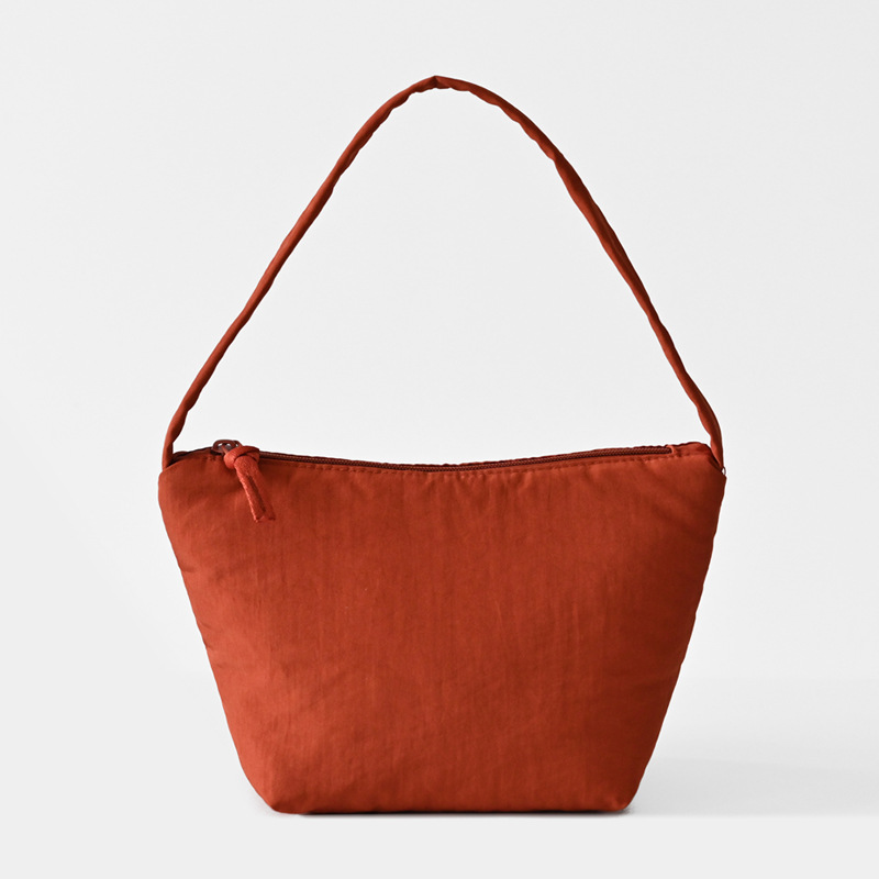 A new 2024 simple and casual bucket bag for women from the Korean forest style, featuring a niche and high-end underarm shoulder bag Item Picture