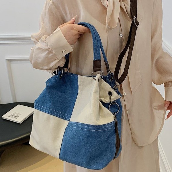 A new 2025 canvas bag for women, with a large capacity, artistic and retro style, and a unique texture for commuting. It is a hand-held shoulder crossbody bag Specification drawing