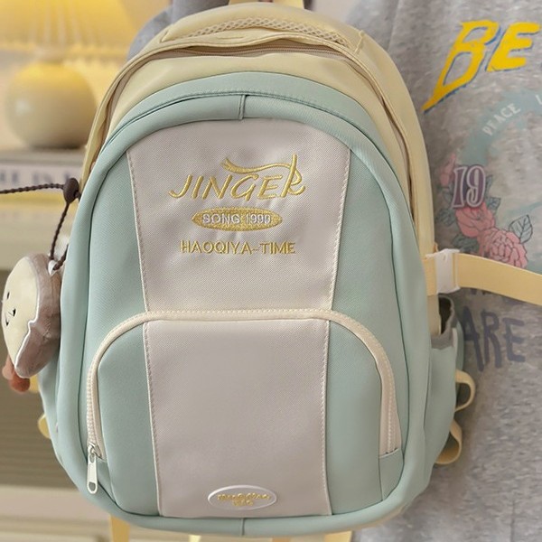 Korean-style ins backpacks for female college students, multi-layered and versatile backpacks, and travel backpacks for junior high school students full figure