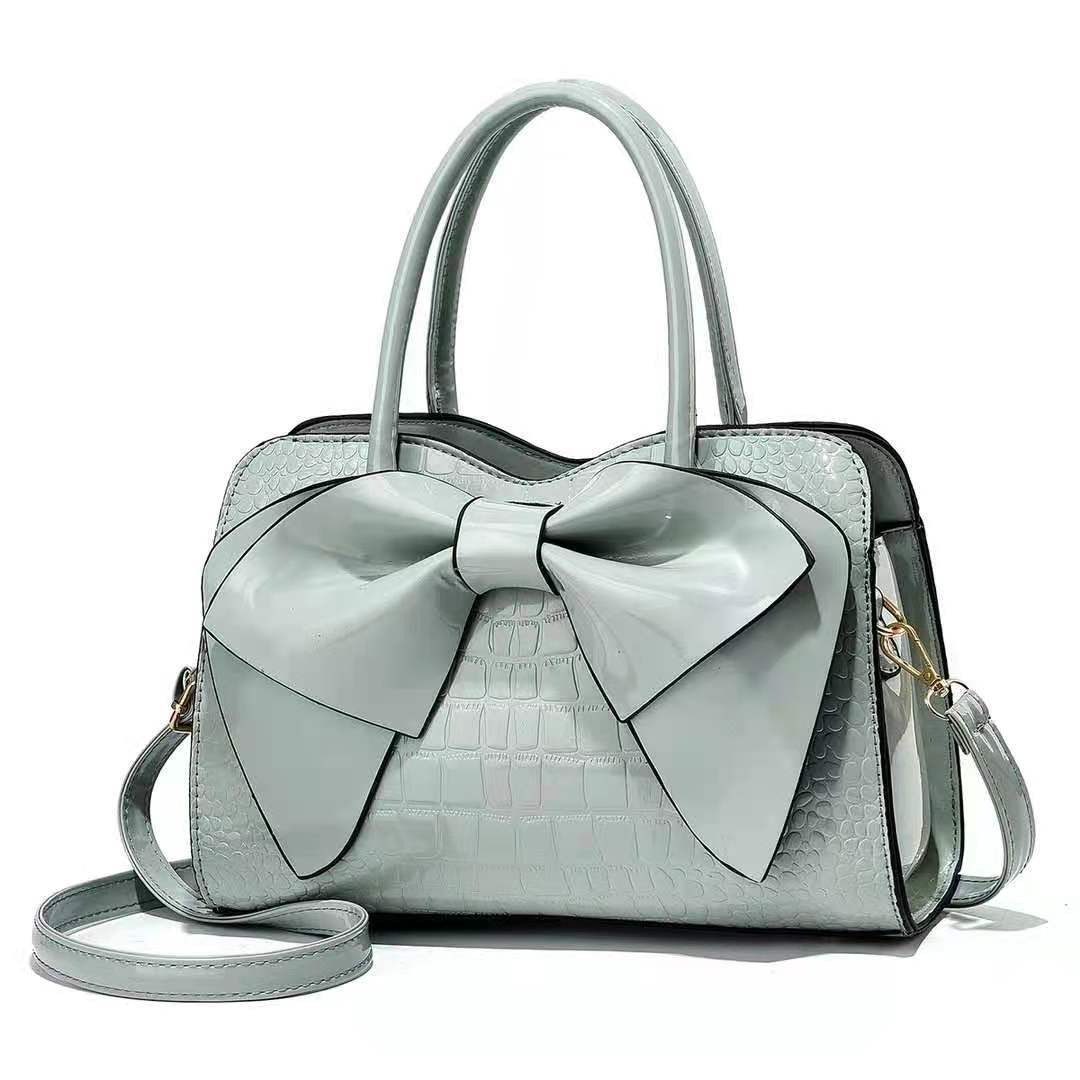 Cross-border foreign trade hand-held large bag 2022 New style fashionable crocodile pattern bow bucket bag patent leather shiny crossbody bag Item Picture