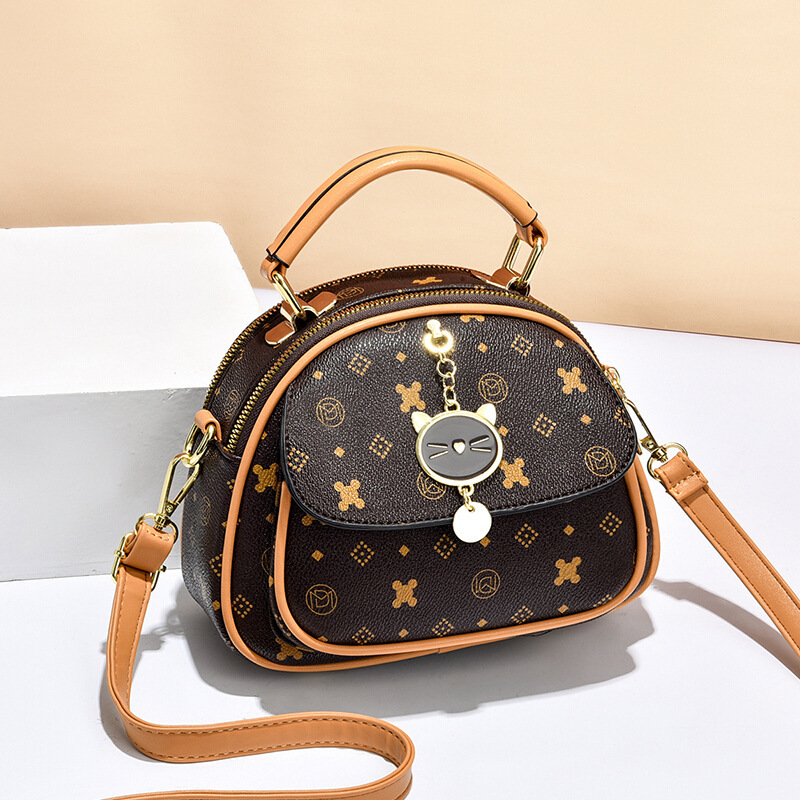 The new printed cartoon women's bag with multiple layers is a super popular single-shoulder bag for women to carry diagonally details Picture