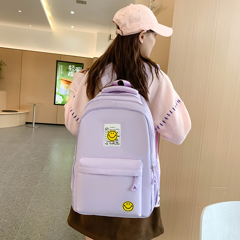 2025 New Japanese-style schoolbag for girls and middle school students, simple solid color, versatile ins fresh forest style backpack Application Scenario