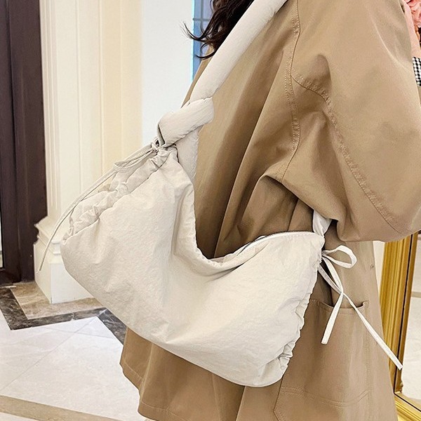 Outdoor sports style large-capacity nylon single-shoulder crossbody bag, retro tie handbag, women's casual solid color underarm bag Specification drawing