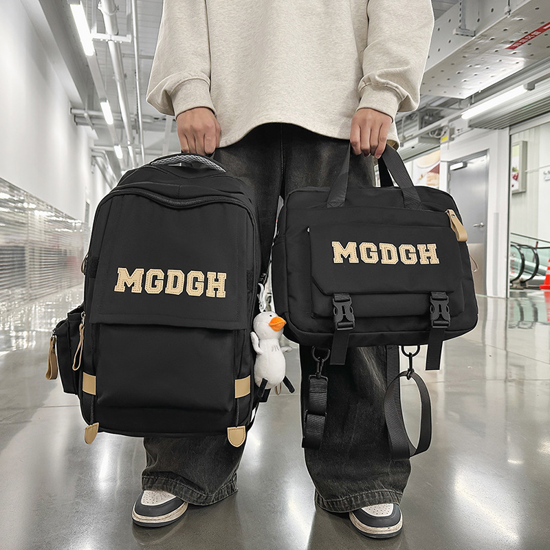 New Korean version large-capacity backpacks with letters for both men and women are available in spring. This two-piece set is a versatile backpack for junior and senior high school students details Picture