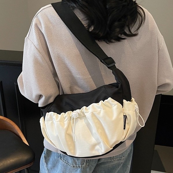 A new, niche, color-blocking, lightweight outdoor backpack for casual girls with a large capacity drawstring opening in 2025 Specification drawing