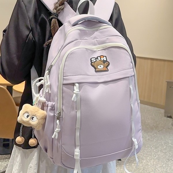 This cute and fresh schoolbag for female students has a large capacity and high appearance level. It is a versatile and trendy backpack with a contrasting color design full figure