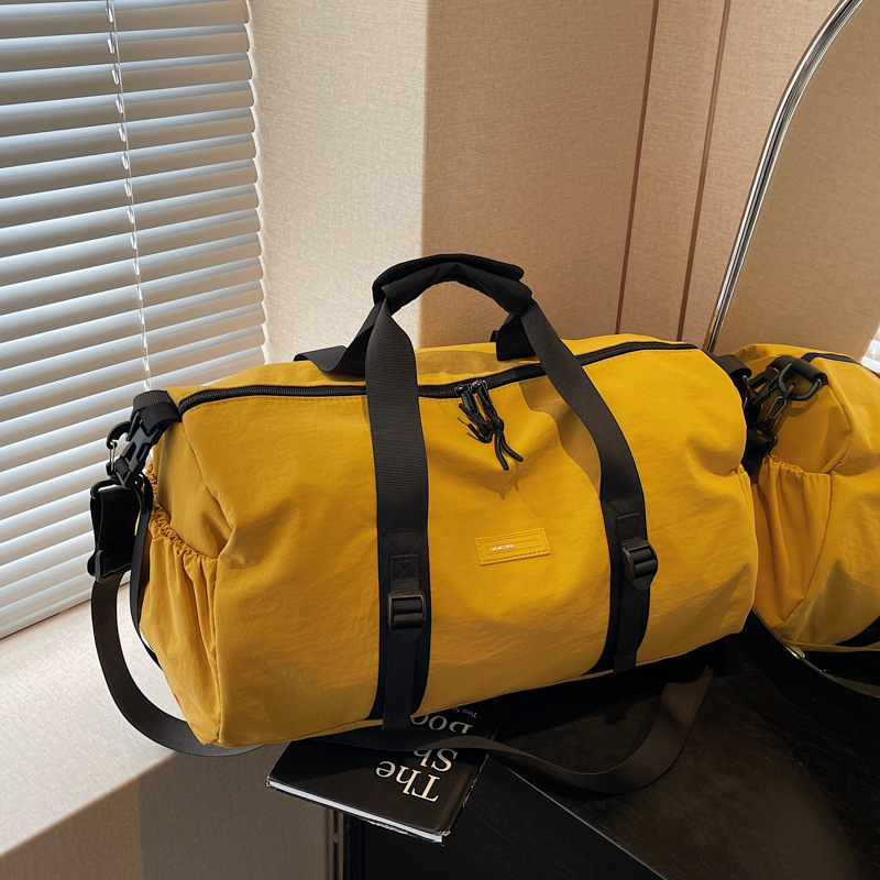 Men's and women's fashionable sports and fitness bags, large-capacity business trip luggage storage bags, Korean-style Instagram versatile and lightweight travel bags full figure