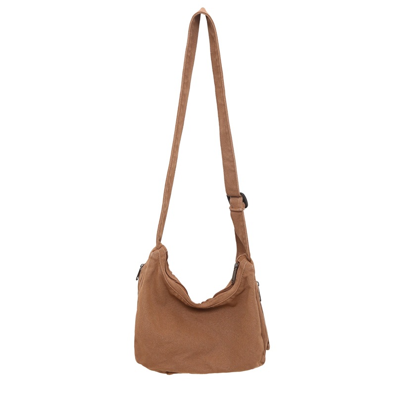 Canvas dumpling bag 2024 New style ins single-shoulder bag for women, laid-back casual crossbody bag, solid color retro small backpack Item Picture