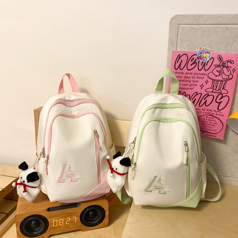 Cross-border Korean version niche design for female junior high school and primary school students, high appearance level, large capacity travel backpack for outings Specification drawing