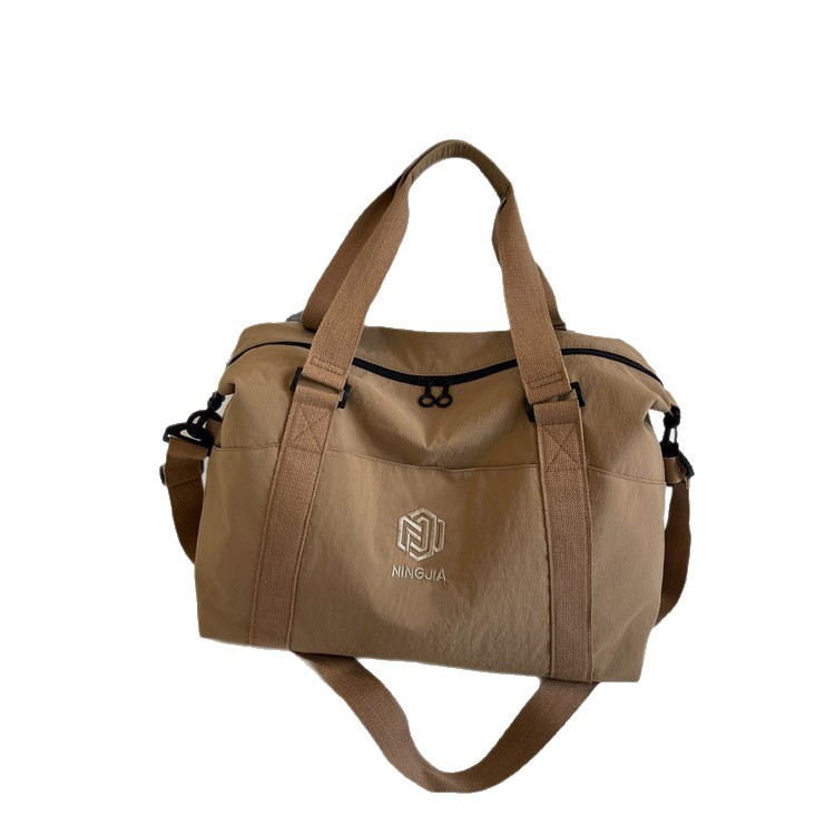 Fashionable, lightweight and large-capacity travel bag, suitable for both men and women, outdoor luggage bag, hand-held camping sports and fitness bag Item Picture