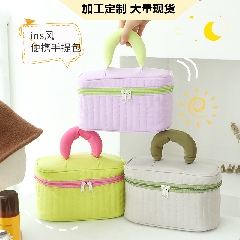 A small, large-capacity, cute, simple, waterproof cosmetic storage bag for Instagram, a portable handbag for going out full figure