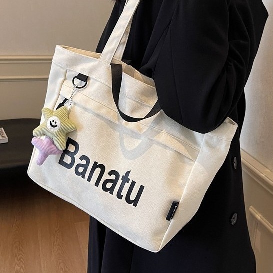 Large-capacity student handbag, canvas, large-capacity casual commuting, new school style, versatile single-shoulder for 2024 autumn and winter Application Scenario