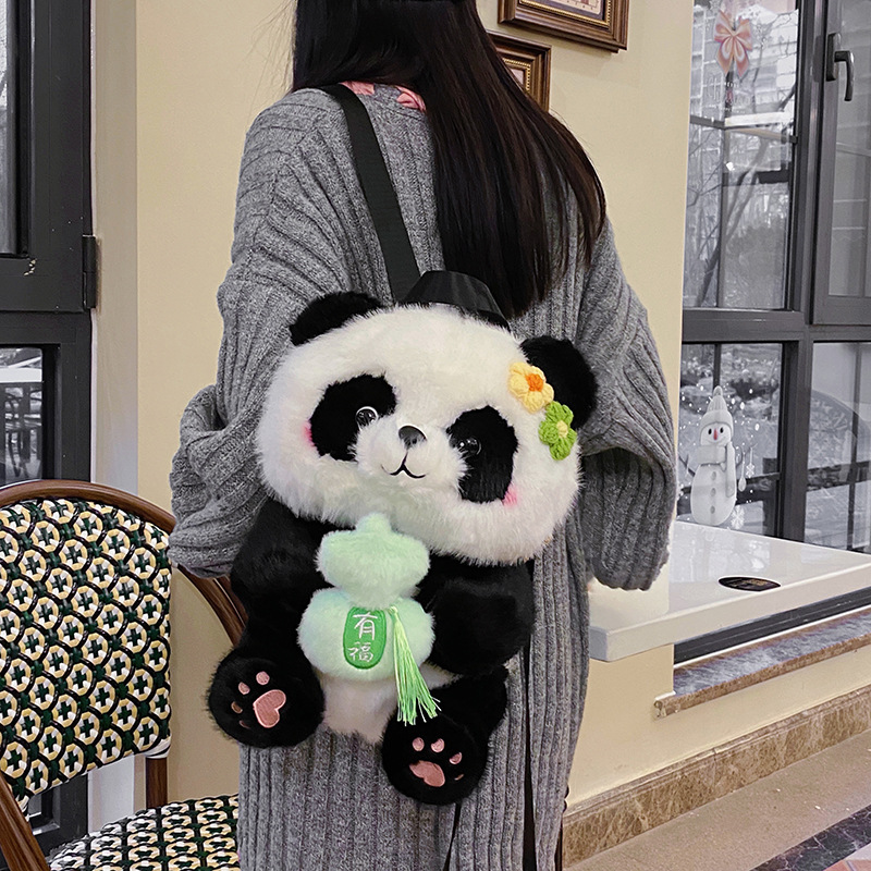 A new cartoon panda backpack with a high level of appearance, a large-capacity student backpack, a claw machine doll to exchange for a girl's heart bag details Picture