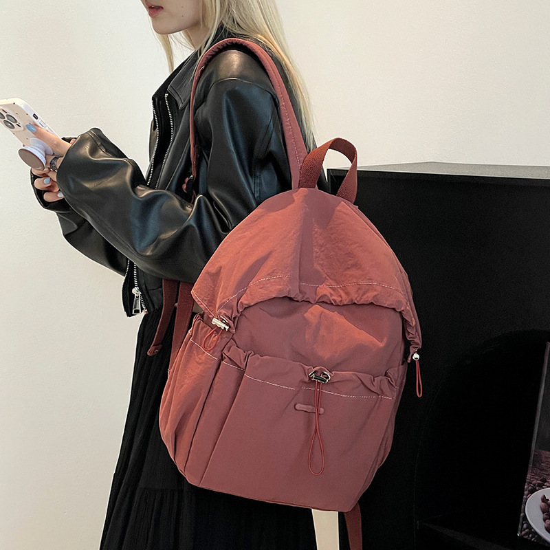 Colorful Fox Japanese and Korean new women's solid color pleated nylon fabric backpack, lightweight commuting large capacity backpack full figure