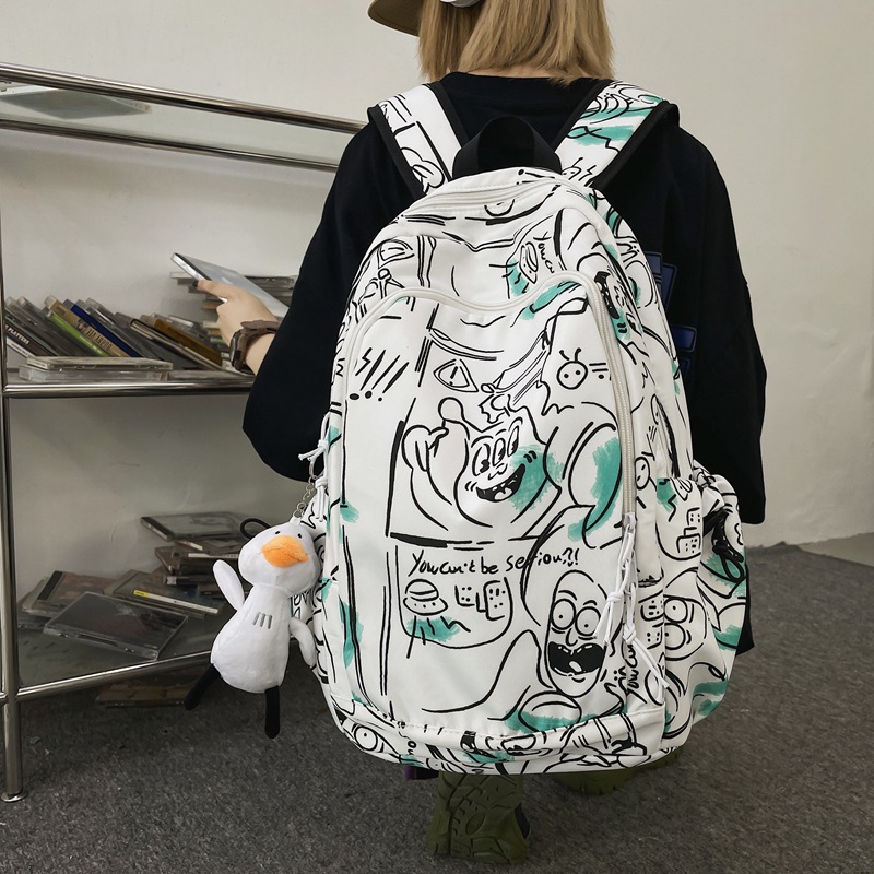 Fashionable graffiti printed schoolbag for girls, cool and trendy ins Japanese Harajuku style backpack, simple college student high school backpack Specification drawing