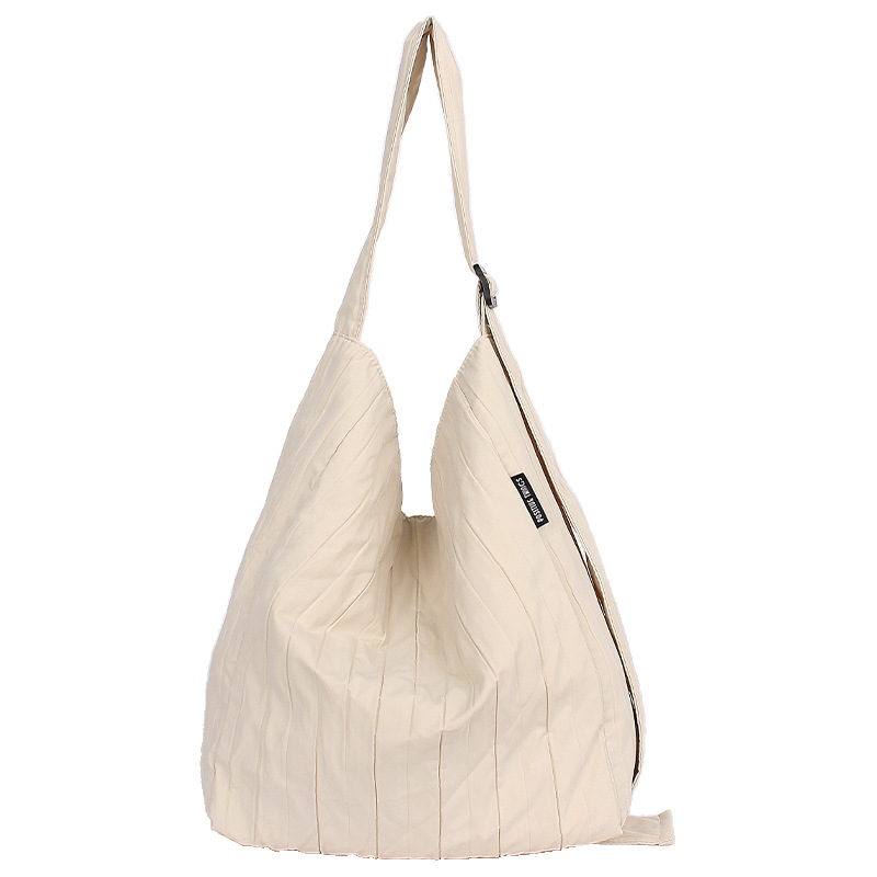 2025 New versatile pleated nylon underarm bag for women, simple and elegant commuting solid color, large capacity single-shoulder bucket bag Item Picture