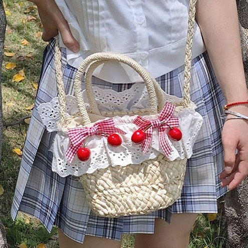 Summer's new straw-woven girl's bag, bow lace flower forest-themed vegetable basket, sweet family outing beach bag details Picture