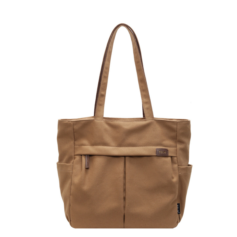 A new best-selling, niche, casual and simple style large-capacity solid-color fabric bag, a versatile single-shoulder women's bag for students' commuting to class Item Picture