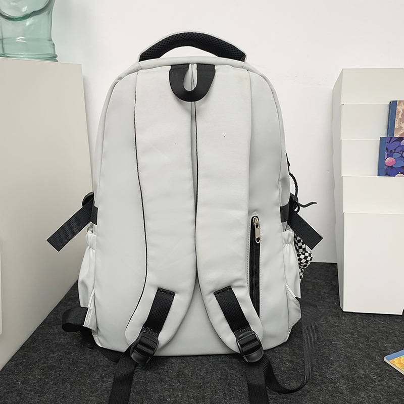 Korean version of Instagram trendy couple backpacks for college students, high school girls with contrasting colors, and multi-layered backpacks for teenagers and students Specification drawing