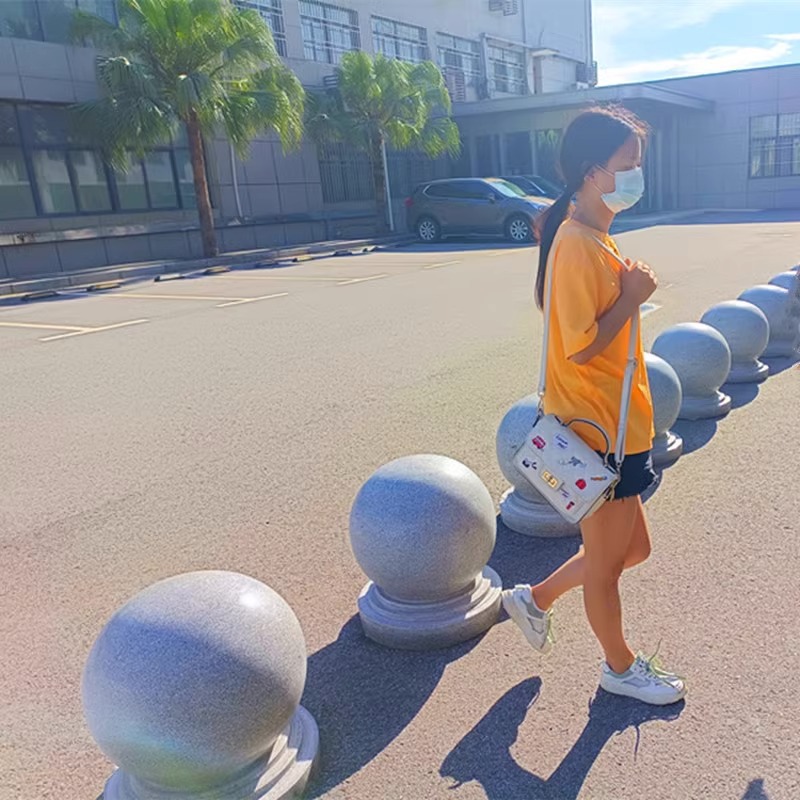 Granite roadblocks, stone balls, marble, sesame grey, car-blocking round balls, school, community, square, car-blocking and road-blocking stone piers details Picture