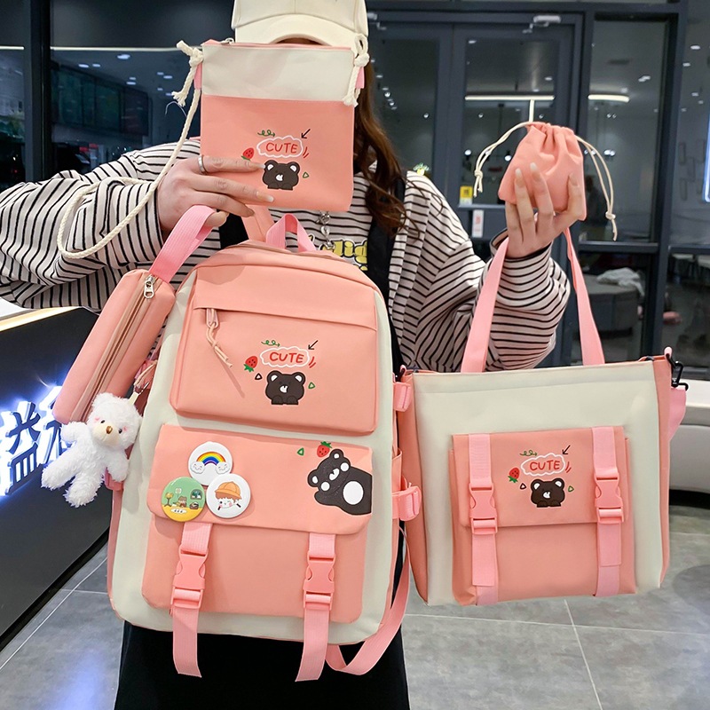 Wholesale of new nylon five-piece set schoolbags for primary school girls, which are lightweight, lightweight, wear-resistant and have a large capacity for junior high school students full figure