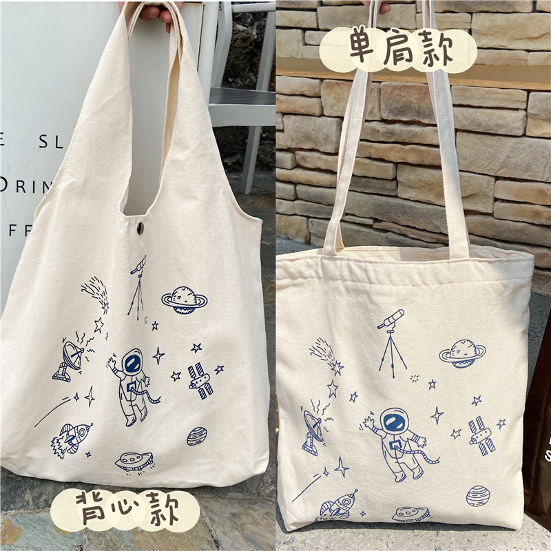 1322 Harajuku style astronaut cartoon printed canvas bag ins Soft girl college student hand-held cloth bag vest for girls Application Scenario