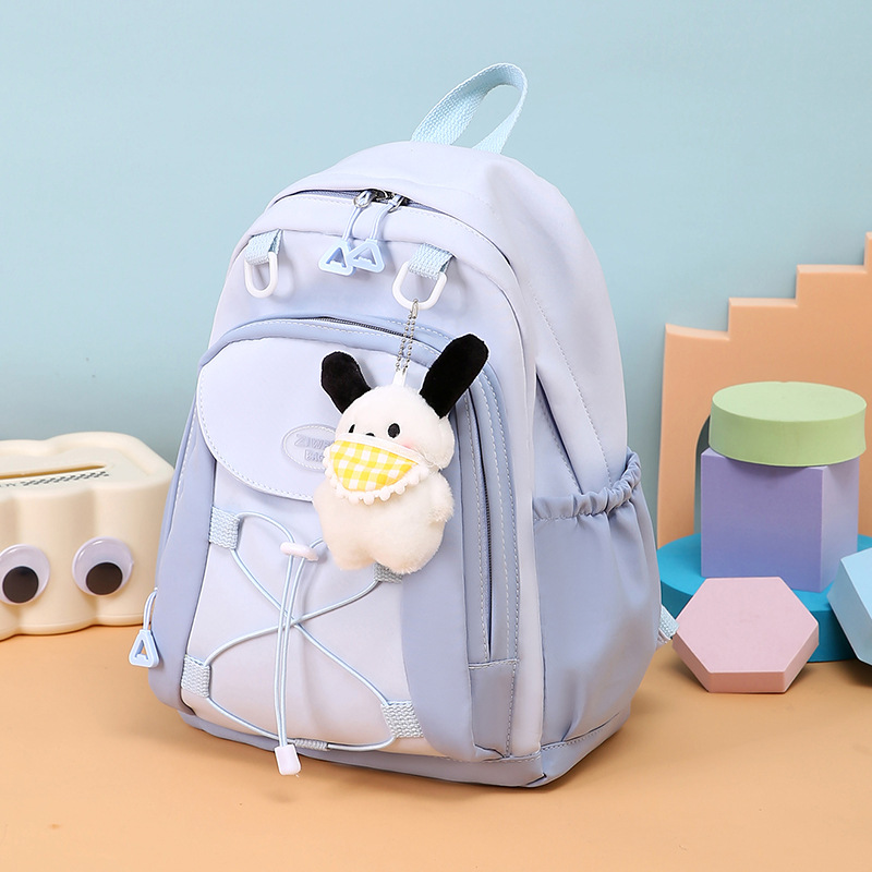 The new backpack is a simple Harajuku children's small backpack with a fresh and clean look, large capacity, cute and lightweight, and a color-blocking schoolbag details Picture