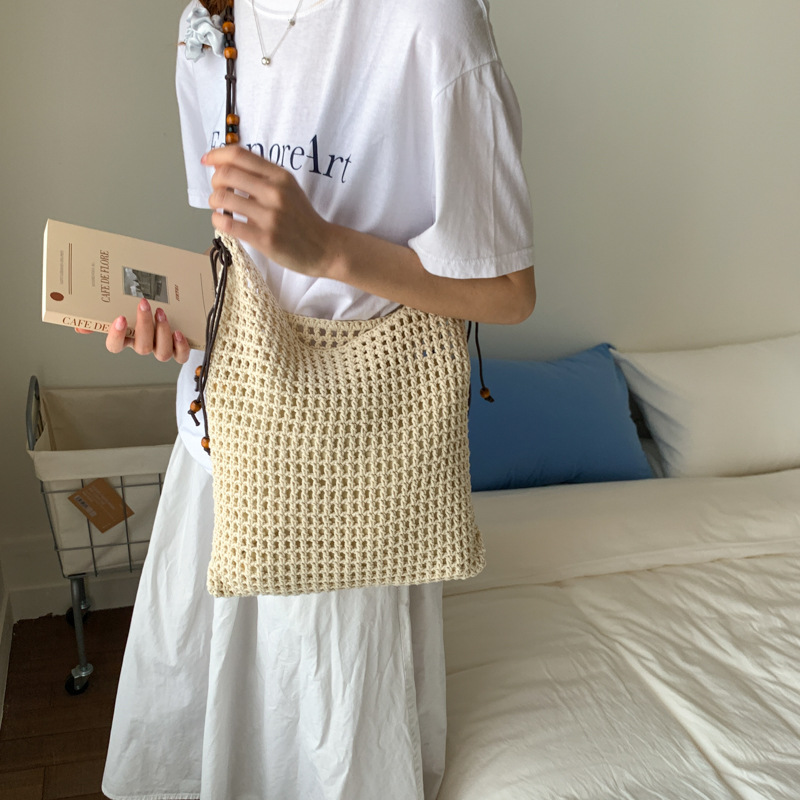Hollowed-out woven fashionable large-capacity bucket bag for women, new summer 2025 vacation style, beach and seaside straw woven single-shoulder bag Specification drawing