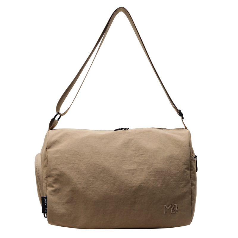 Large-capacity cloth bag, single-shoulder bag for women, 2025 new lightweight and casual crossbody bag, simple bucket bag for spring and summer commuting Item Picture