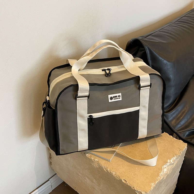 Wholesale of large-capacity travel bags with stretchable handles, lightweight hand-held crossbody storage bags, dry and wet separation sports and fitness bags Specification drawing